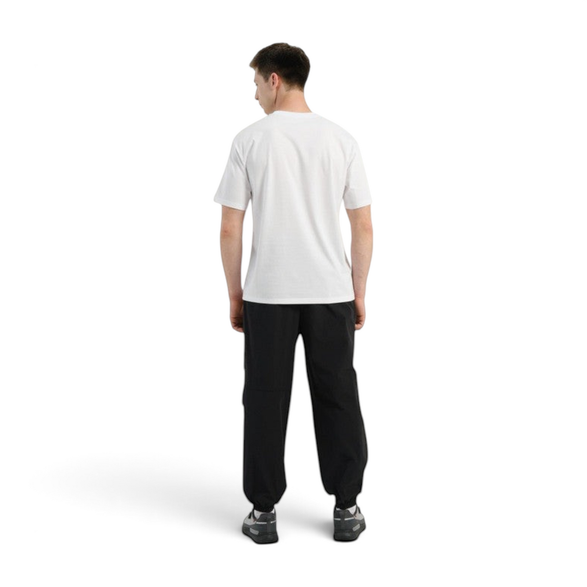FRG COMMUTE relaxed black woven trousers worn by a man in a white t-shirt, back view