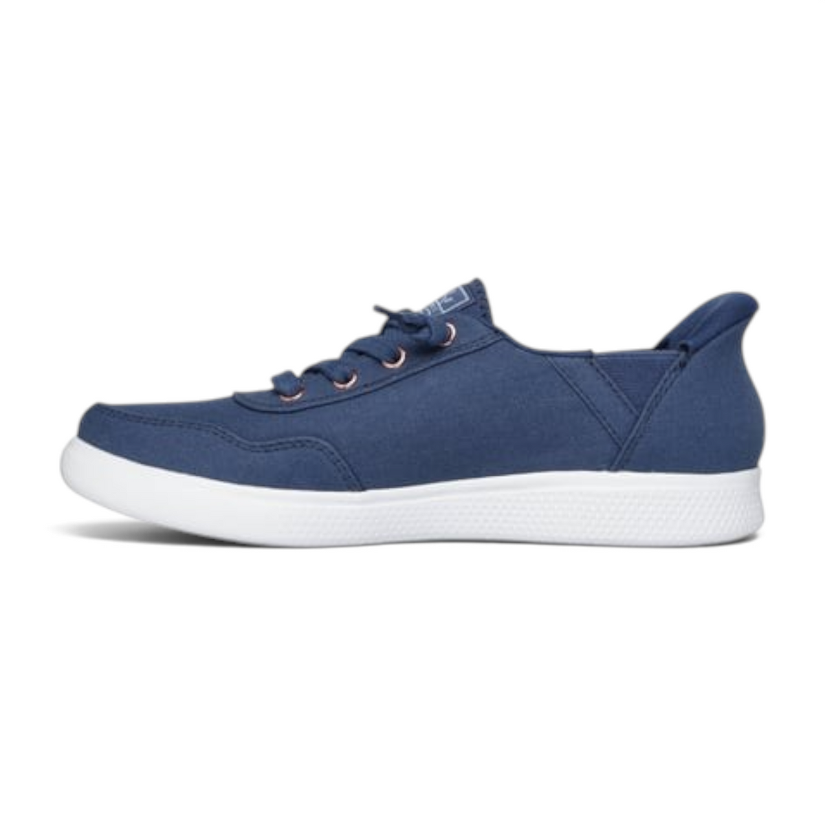 FRG BOBS Skip Cute navy blue canvas slip-in sneaker with faux laces and a white rubber sole, side profile view.