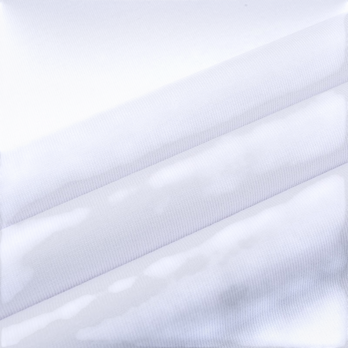 Close-up of white FRG ANTA basketball t-shirt fabric showing soft, breathable cotton-blend texture.