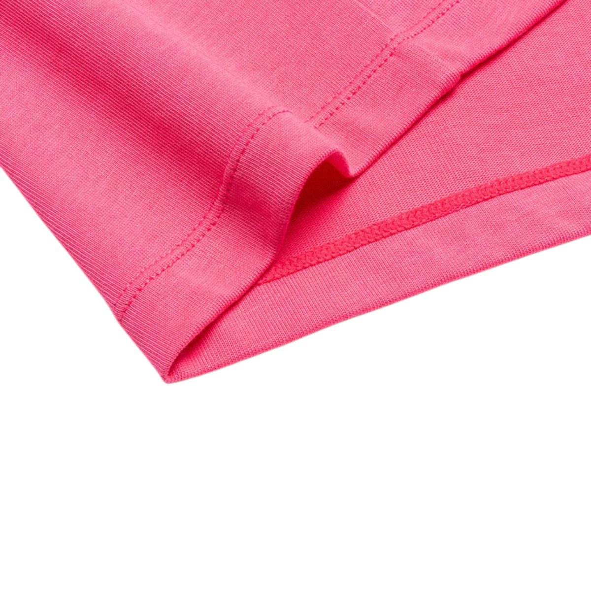 Close-up of the hem of a bright pink FRG SS TEE showing the high-quality cotton fabric and durable stitching.