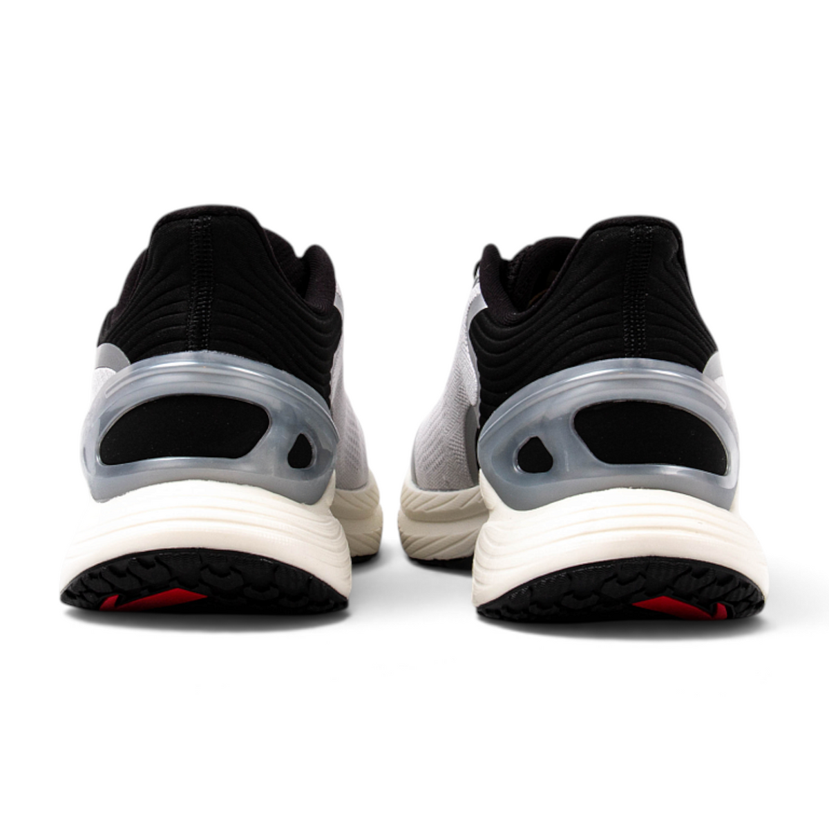 FRG running shoes in grey and black with a white cushioned midsole and translucent heel support detail