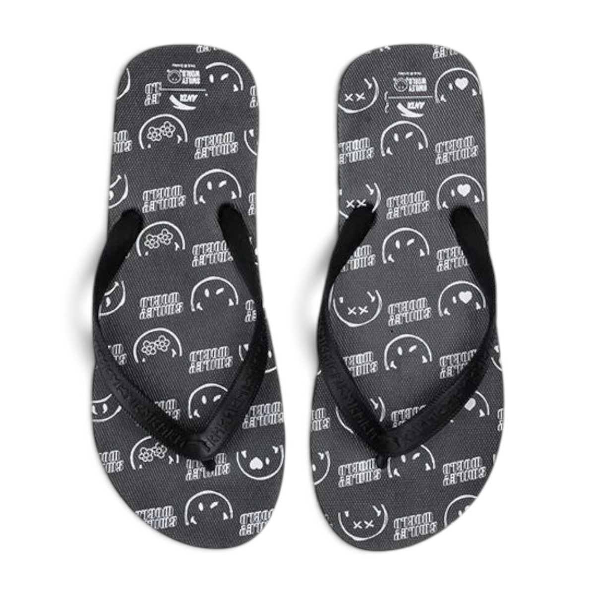 FRG beach slippers in black featuring a white Smiley World pattern and comfortable rubber thong straps