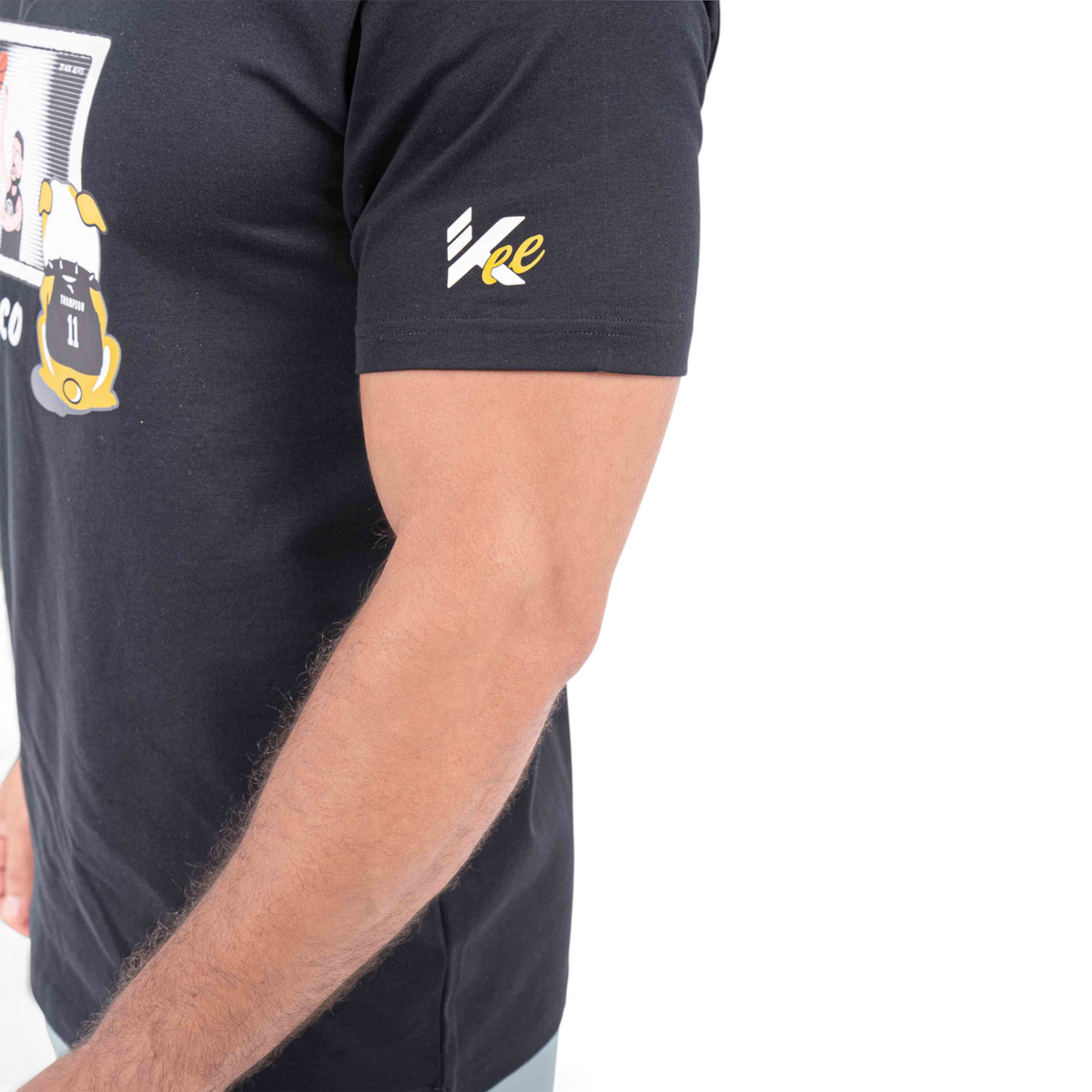 FRG black cotton t-shirt featuring a graphic print on the chest and a yellow and white logo on the sleeve