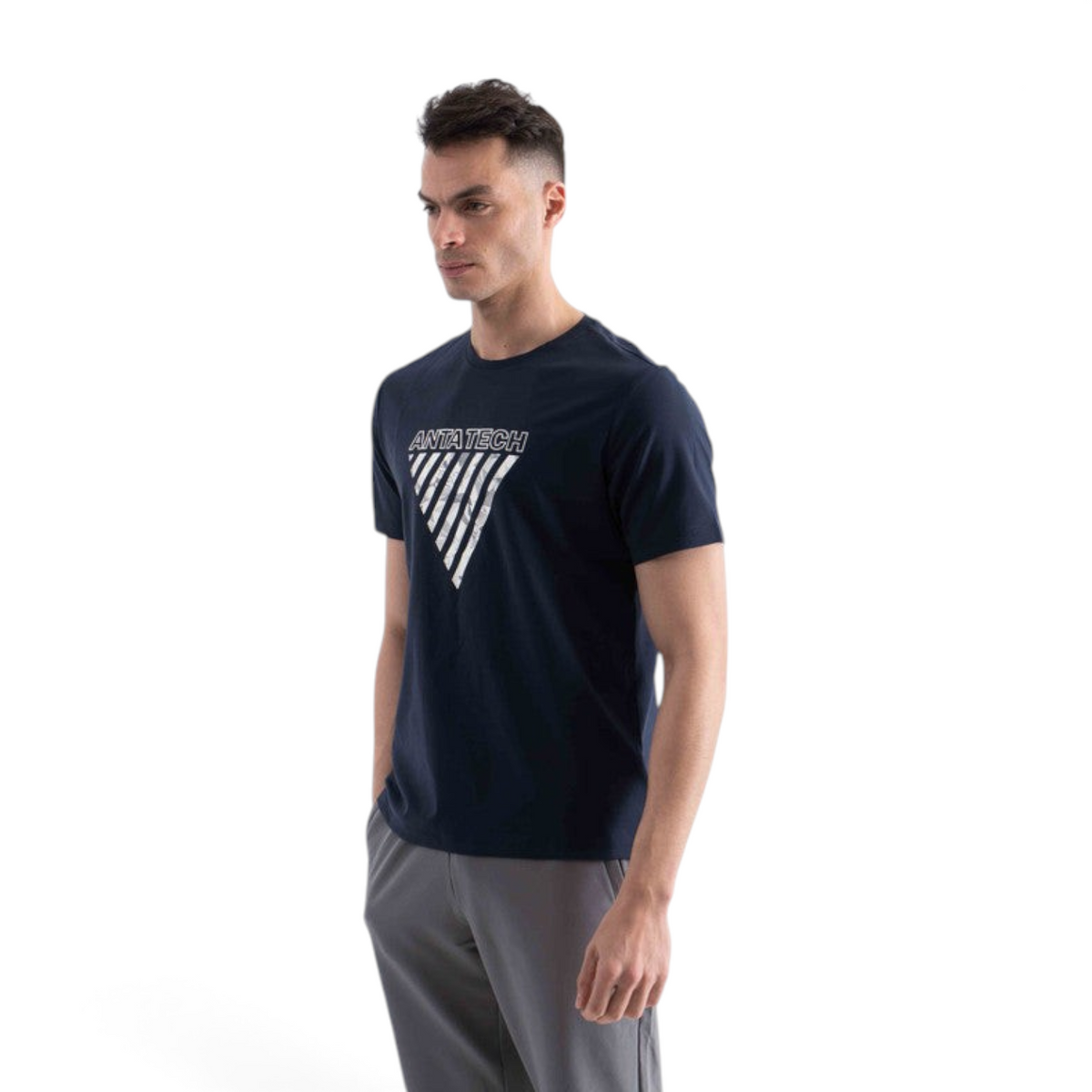 FRG SS TEE in navy blue with a white Anta Tech triangle graphic print on the chest worn by a male model