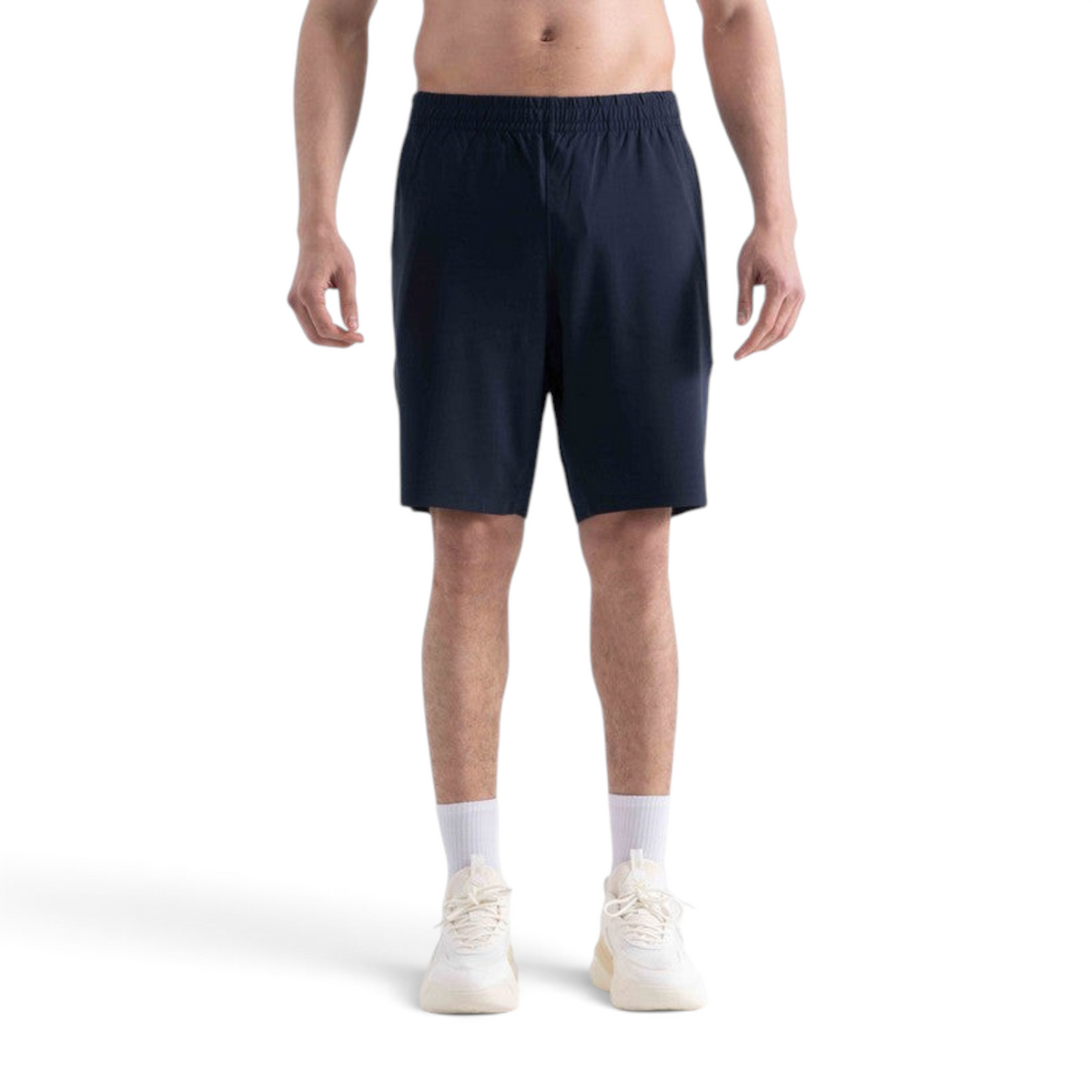 FRG navy blue knit half pants worn by a man with white socks and sneakers