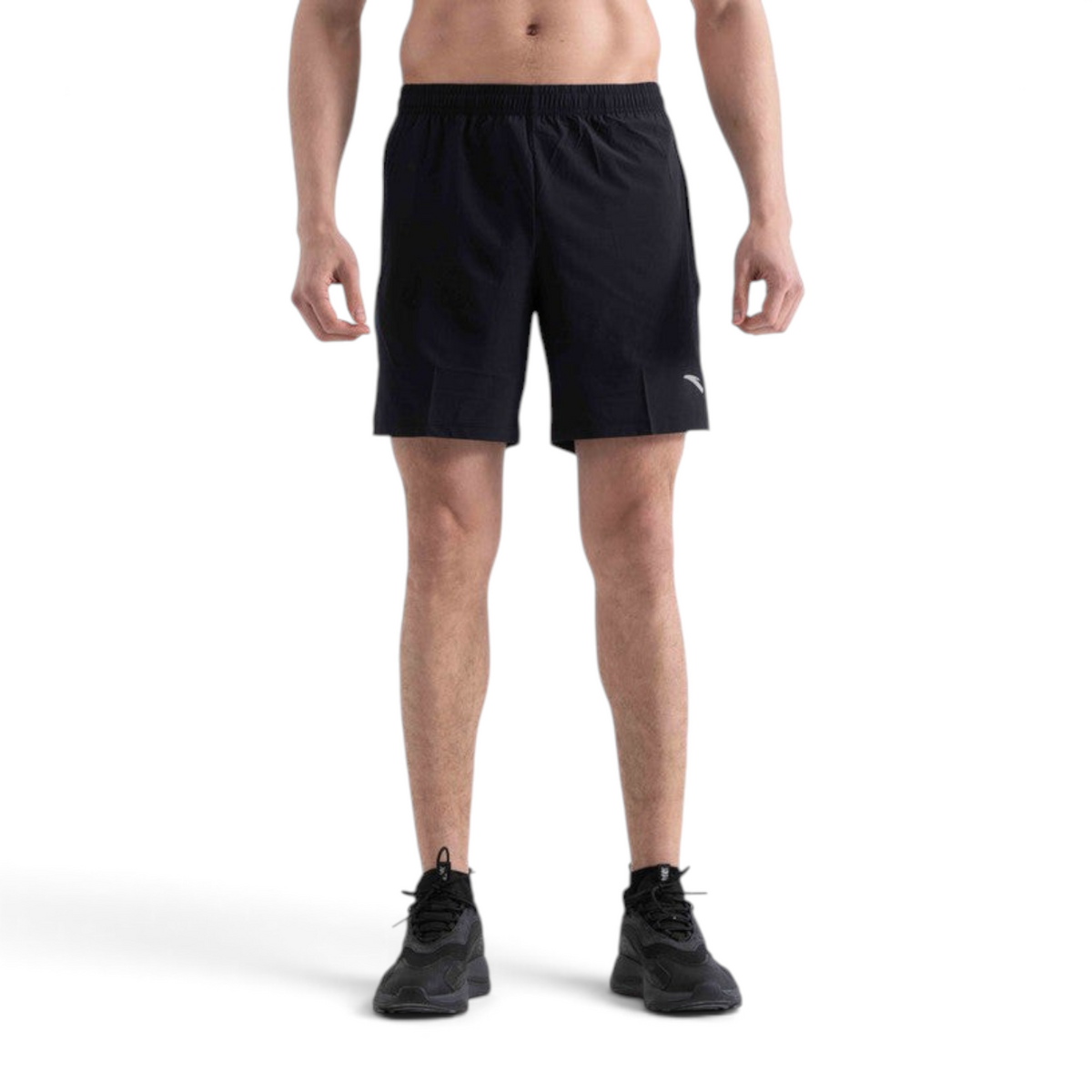 FRG men's black athletic running shorts with an elastic waistband and reflective logo detail on a model