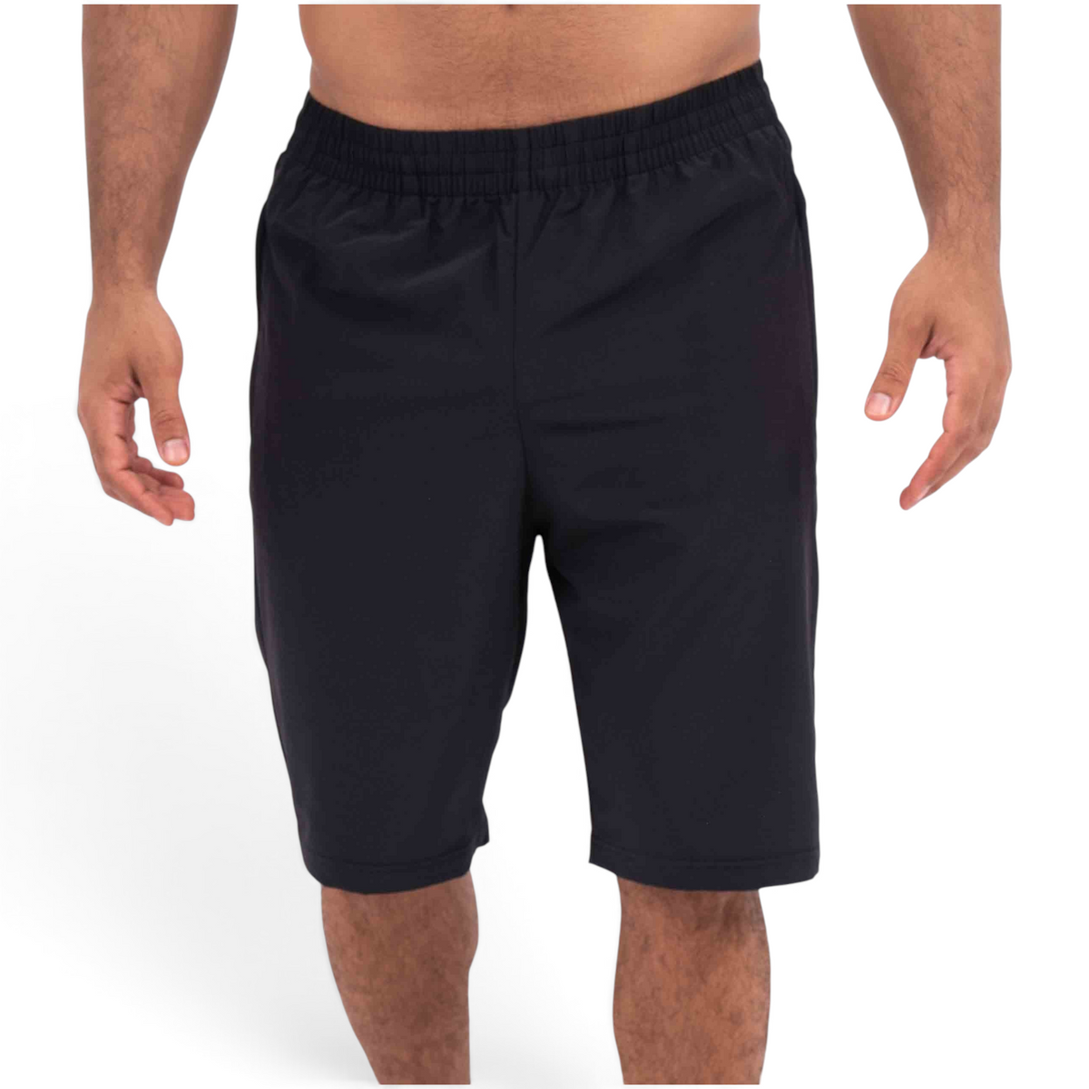 FRG black athletic half pants with an elastic waistband worn by a man against a white background