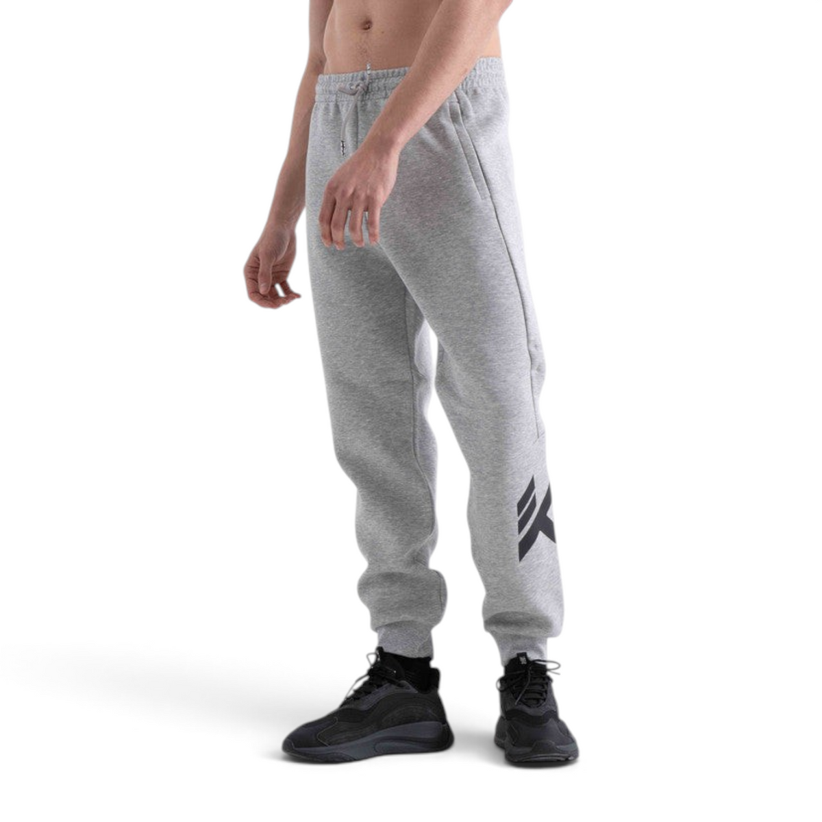 FRG grey knit track pants with a drawstring waist and black logo detail on the leg worn by a man