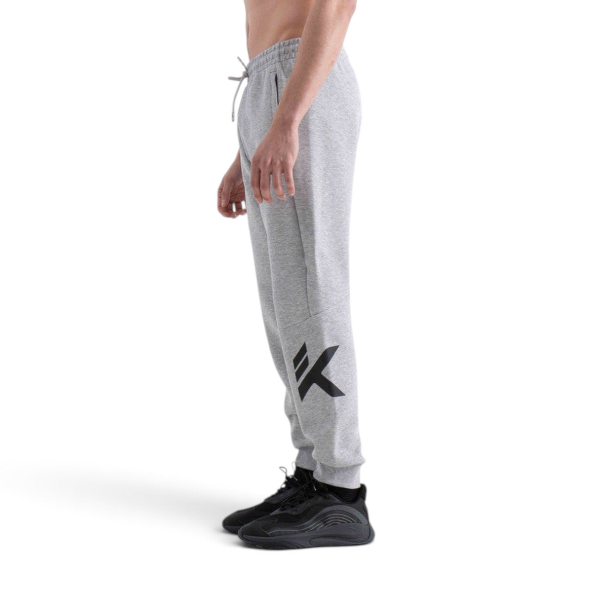 FRG knit track pants in heather grey with a black logo on the lower leg, featuring a drawstring waist and cuffs.