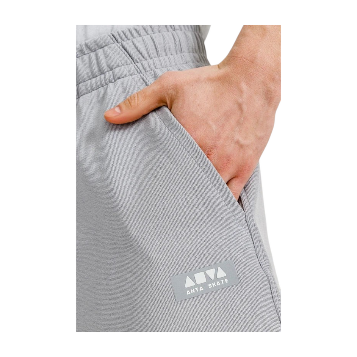 FRG ANTA grey knit half pants featuring a side pocket and branded patch detail on soft cotton blend fabric