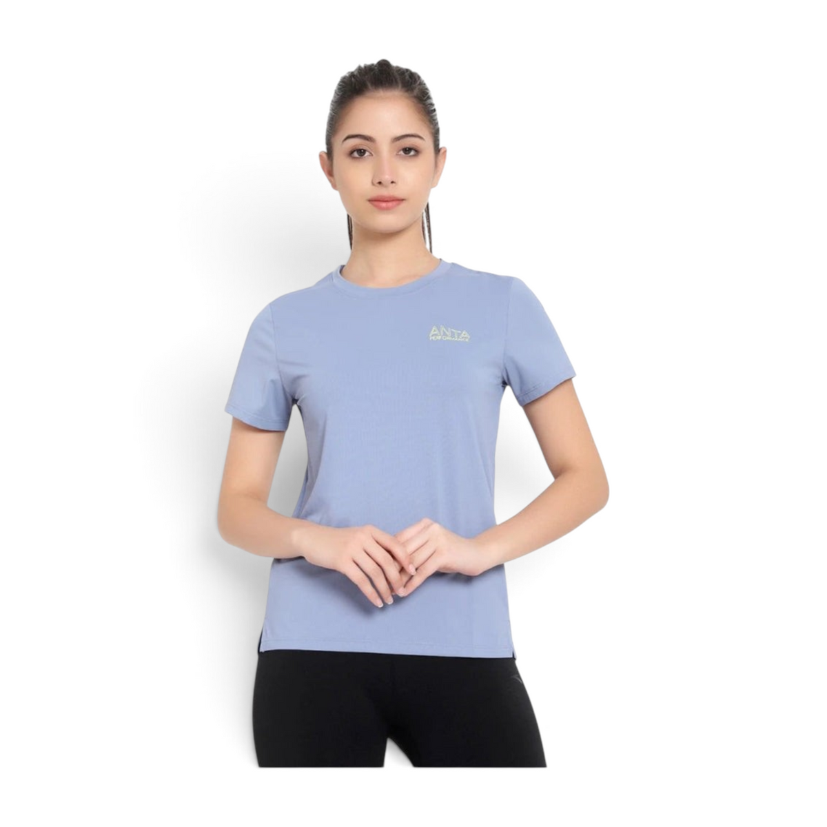 FRG regular fit light blue performance t-shirt made from polyester and spandex blend worn by a woman