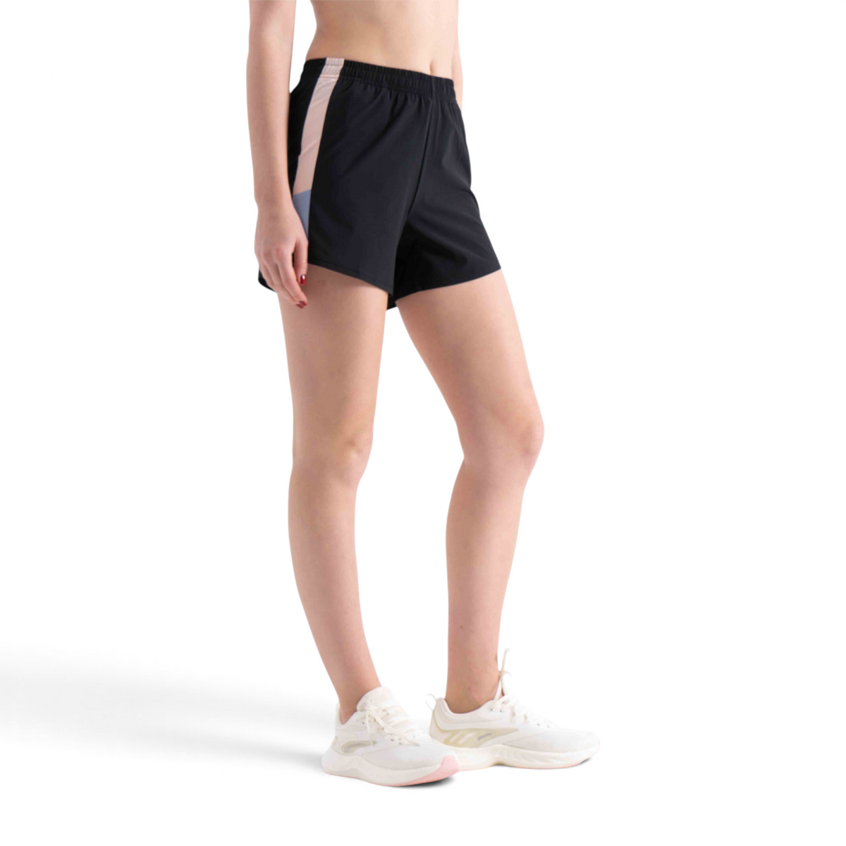 FRG regular fit black athletic shorts with side panel detail worn by a model with white sneakers