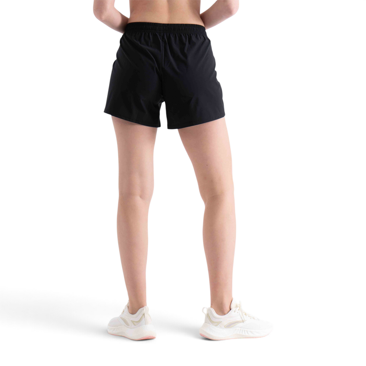 FRG regular fit black athletic shorts made from polyester and spandex blend, back view on a model