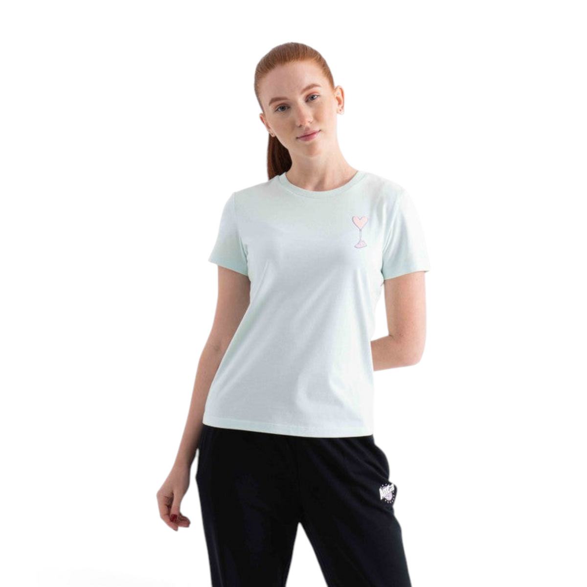 FRG regular fit mint green cotton blend t-shirt with a small pink heart graphic on the chest worn by a model