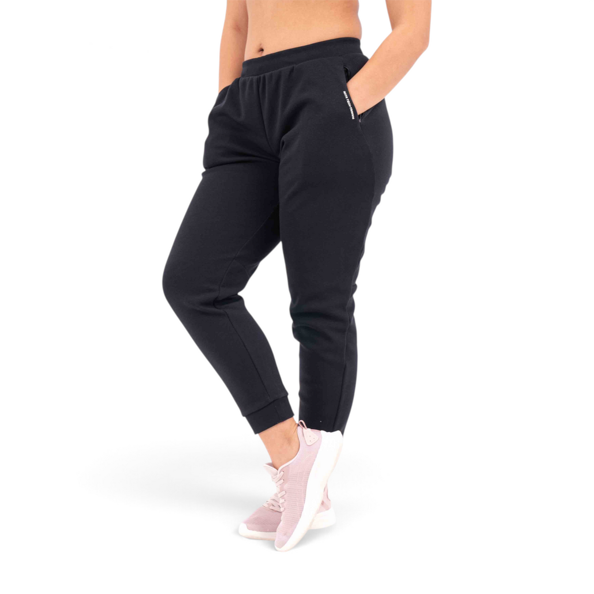 FRG knit track pants in black with a regular fit, featuring side pockets and a comfortable cotton-blend fabric.