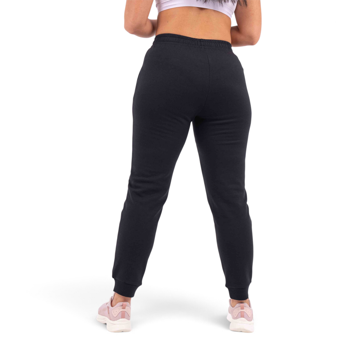 FRG regular fit black knit track pants with elasticated cuffs, worn by a woman from the back view