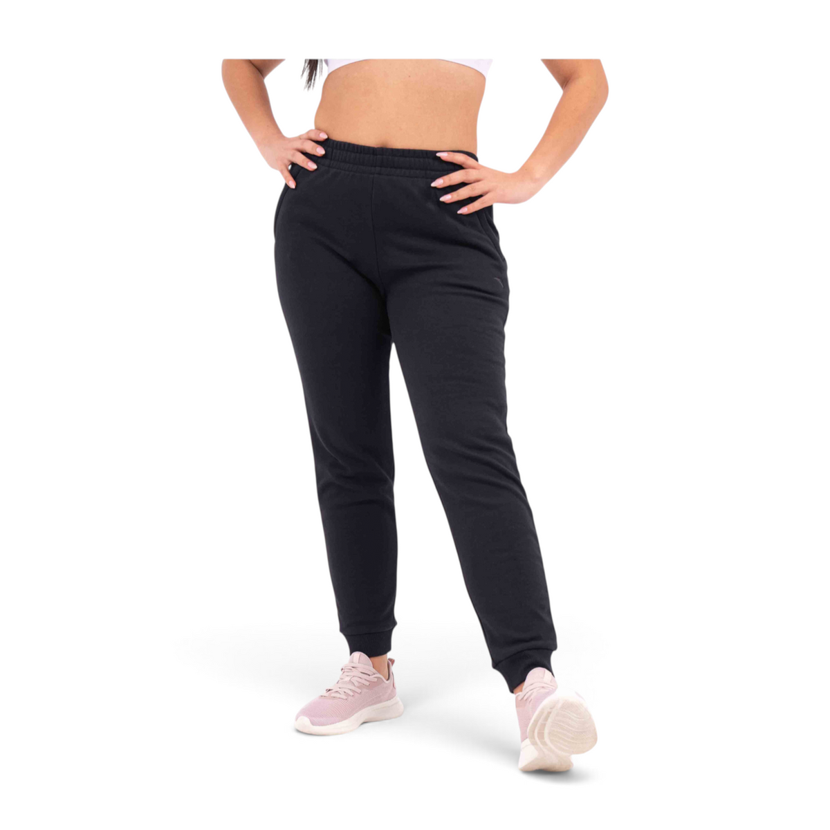 FRG regular fit black knit track pants made from a polyester-cotton blend, worn by a model with pink sneakers.