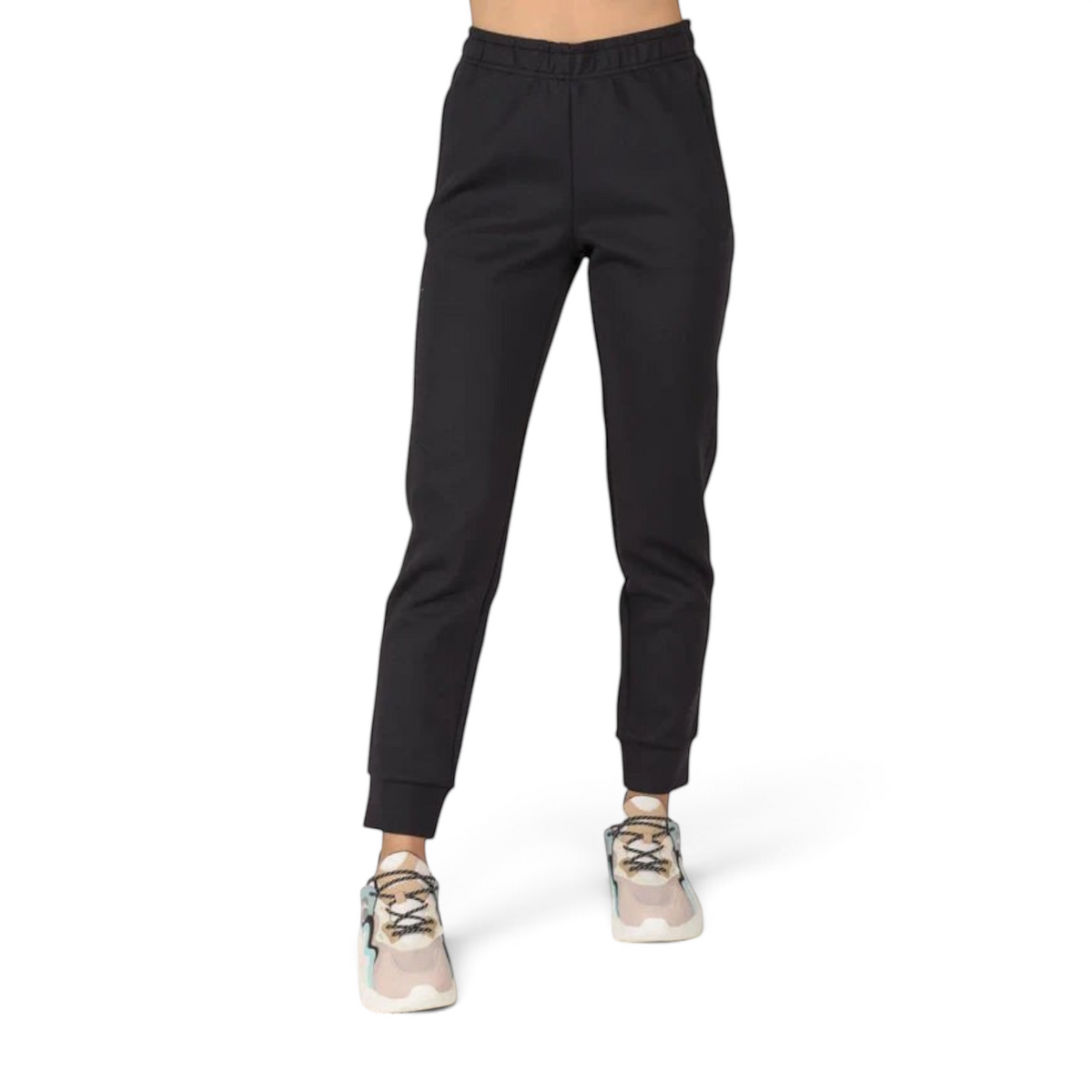 FRG ANTA A-Sports Shape black knit track pants with a comfortable elastic waistband and tapered fit on a model.