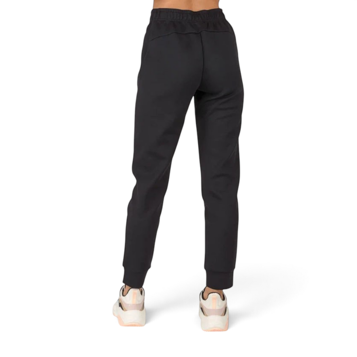 FRG ANTA A-Sports black knit track pants with a tapered fit and elastic cuffs, viewed from the back.