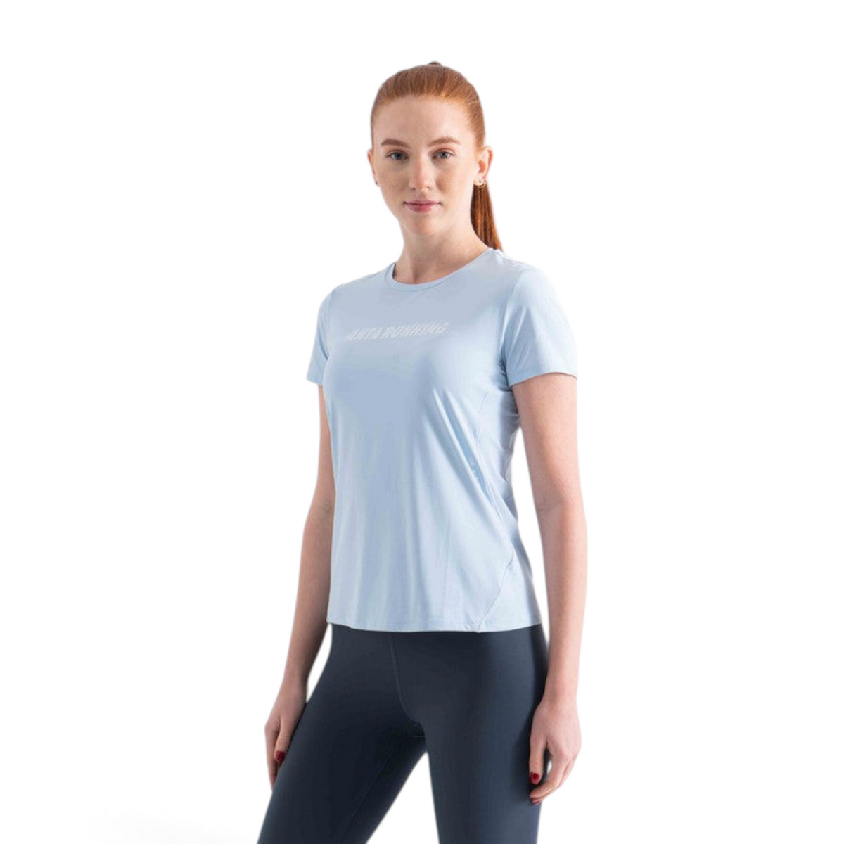 FRG light blue short sleeve running t-shirt with crew neck worn by a woman against a white background