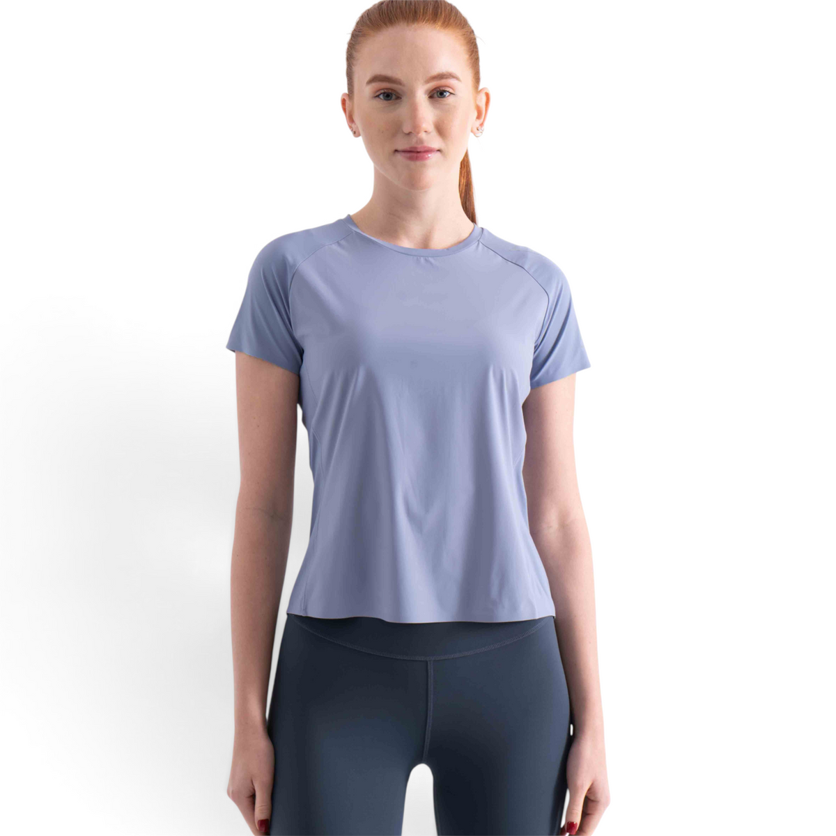 FRG SS TEE in periwinkle blue with short raglan sleeves and a crew neckline worn by a woman against a white background