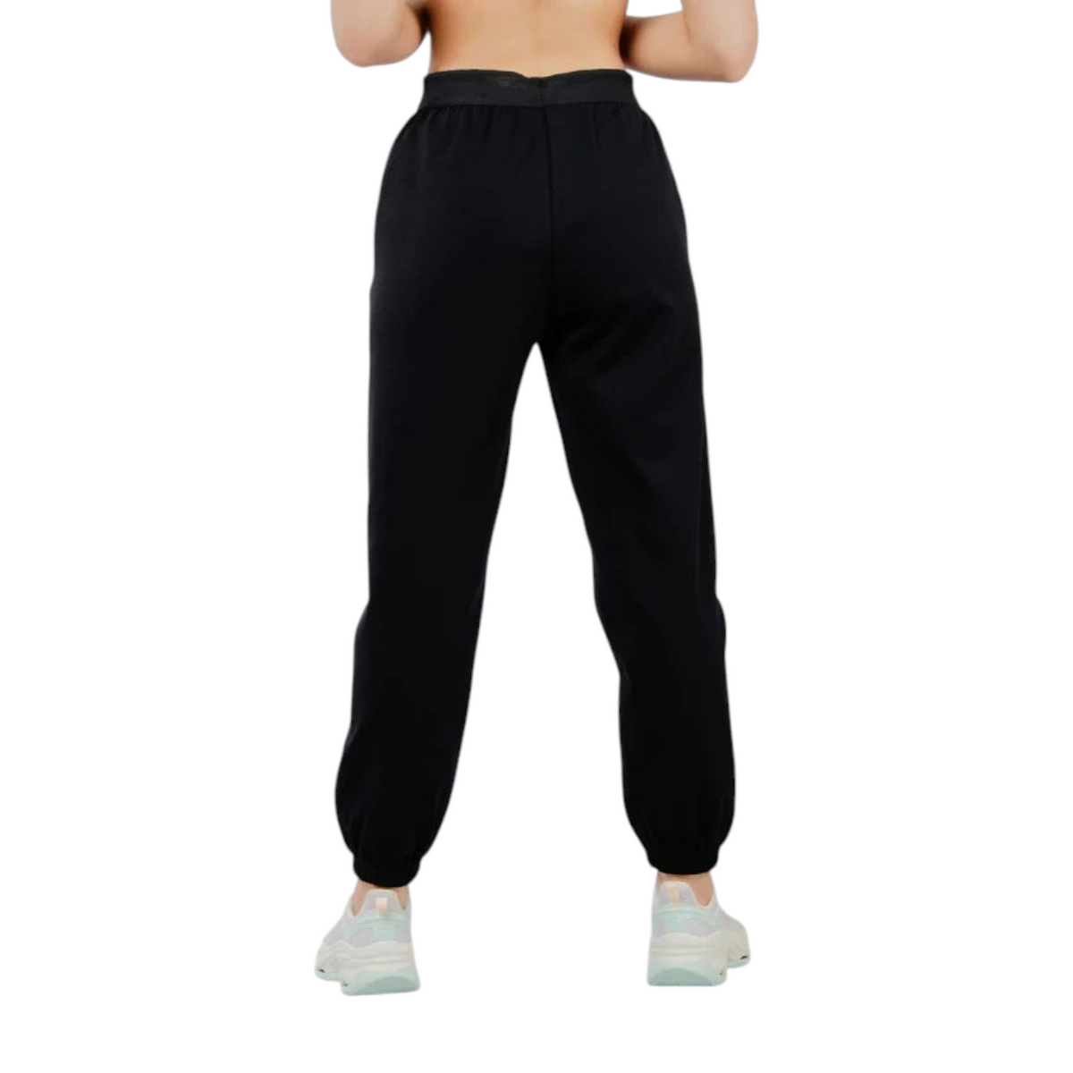 FRG ANTA knit track pants in basic black with an elastic waistband and cuffed hems, shown from the back view.