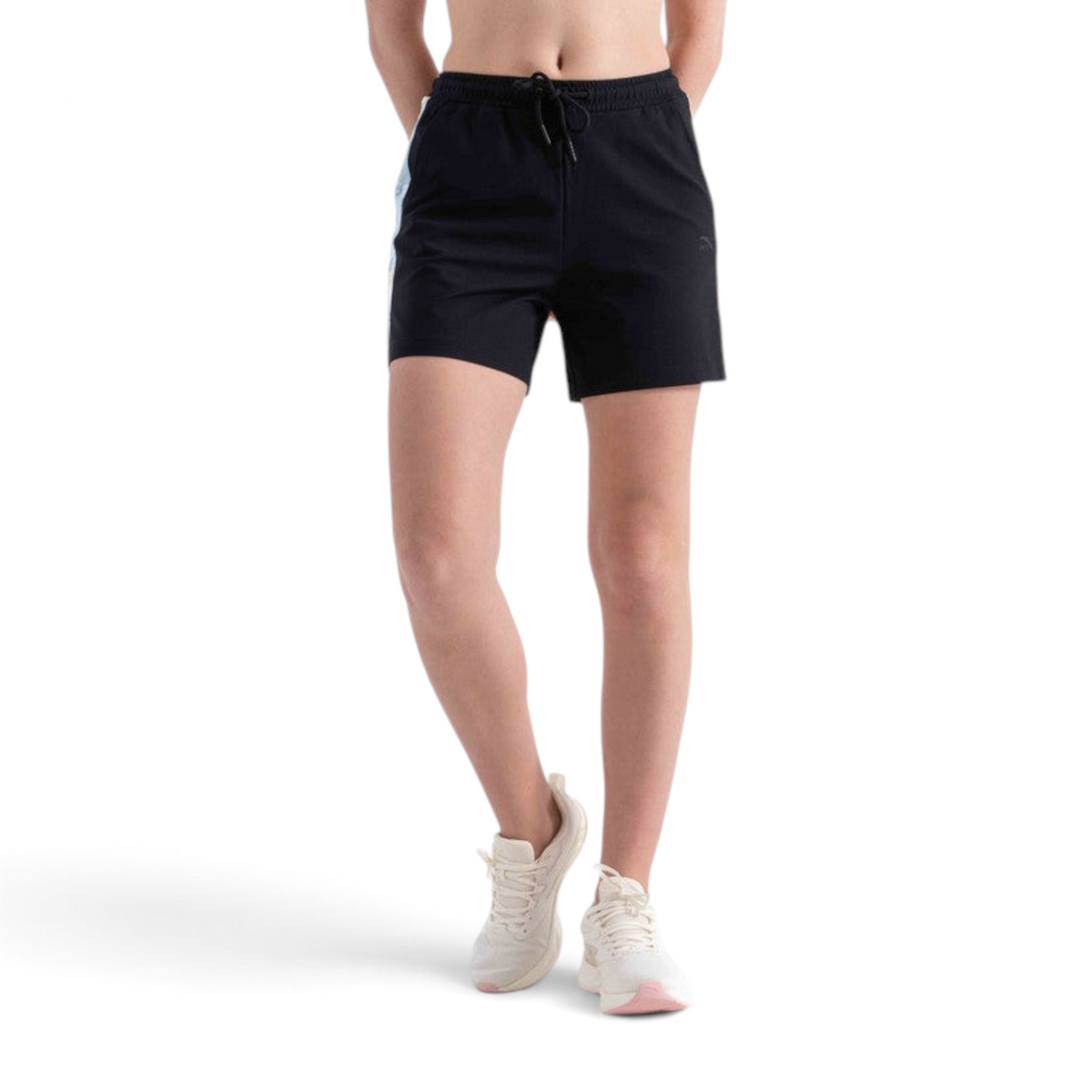 FRG black knit shorts with a drawstring waist and light blue side stripe detail worn by a model