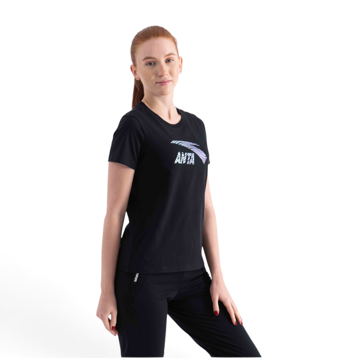 FRG black short sleeve crew neck t-shirt with ANTA graphic logo worn by a woman against a white background