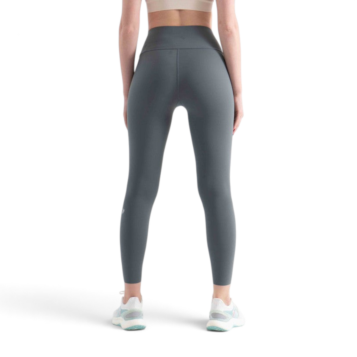 FRG tight ankle pants in dark grey, featuring a high-waisted fit and athletic design, worn by a model from behind.