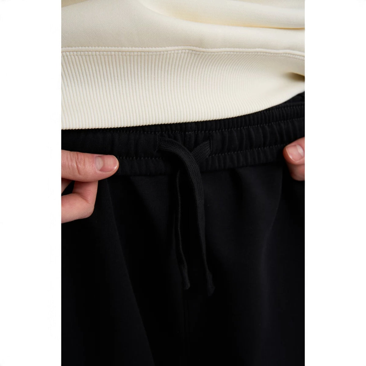 ANTA Women’s CITY PANTS BAR Knit Track Pants in Black – product view 7