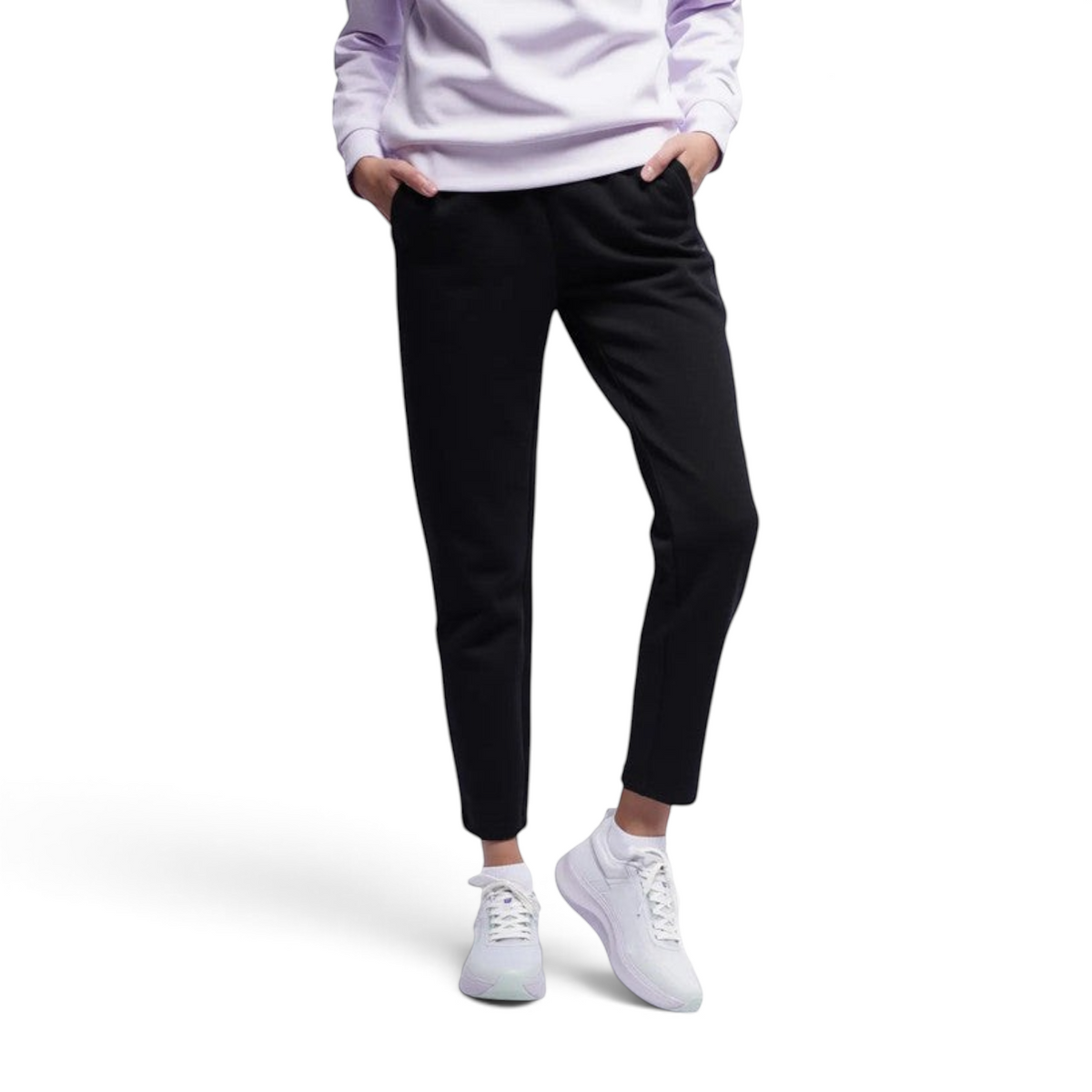 FRG ANTA A-Sports black knit track pants worn by a model with a light purple top and white sneakers