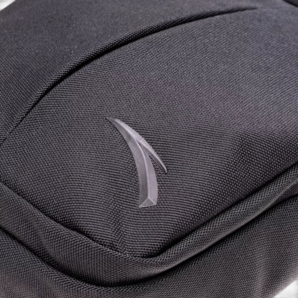 FRG black polyester satchel bag featuring a textured fabric finish and a subtle tonal brand logo detail