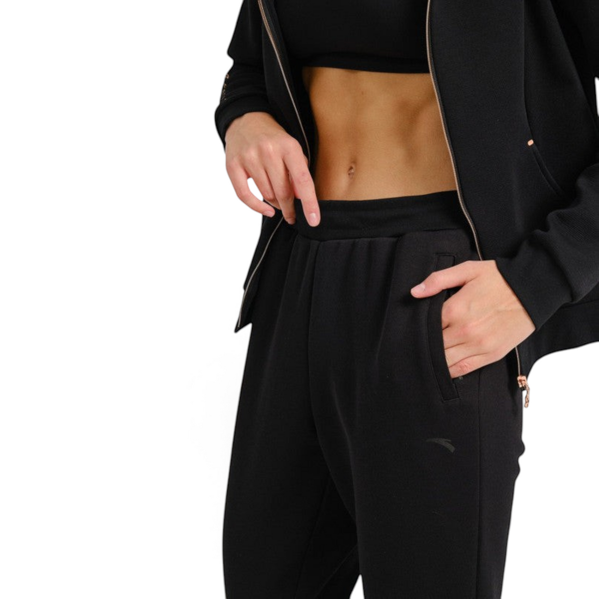FRG ANTA A-Sports black knit ankle pants on a model wearing a matching black zip-up jacket
