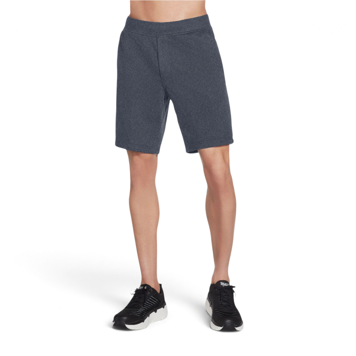 FRG men's charcoal grey knit shorts with an elastic waistband, worn by a model with black athletic sneakers.