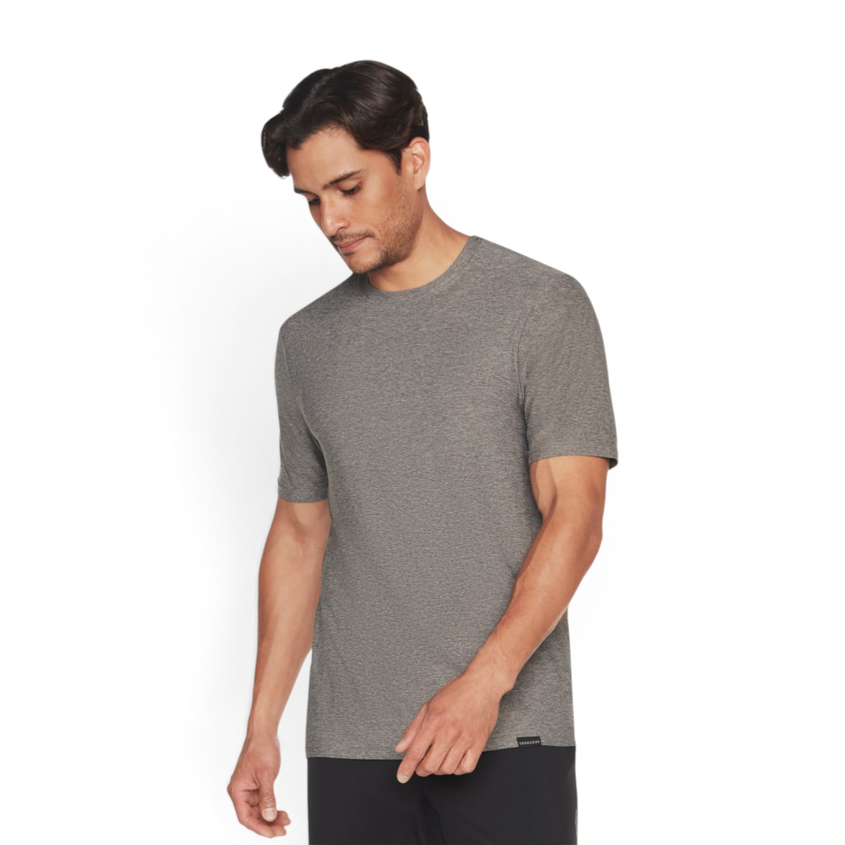 FRG grey moisture-wicking crew neck t-shirt made from recycled polyester blend worn by a man looking down