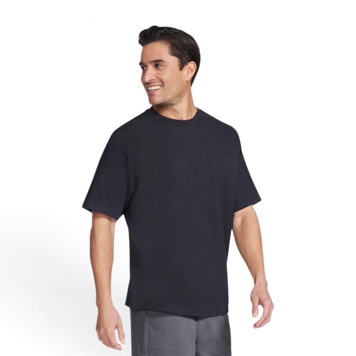 Man wearing a black Skechers JERSEY MAX short sleeve crew neck t-shirt against a plain white background