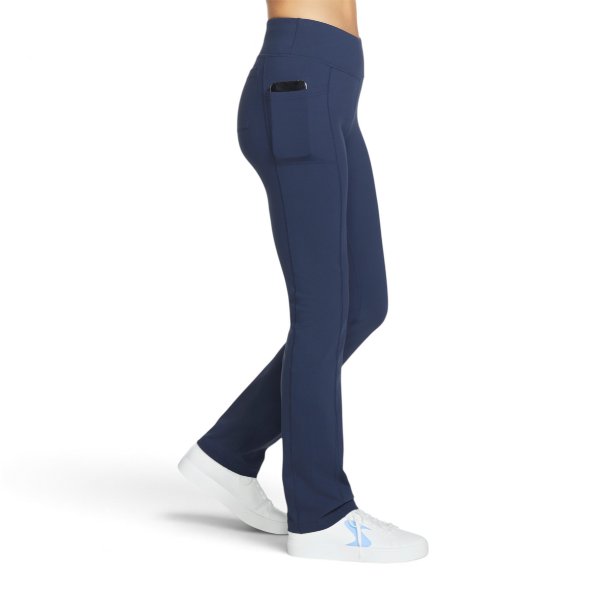 FRG THE GOWALK PANT OG in navy blue with a side pocket, worn by a model with white sneakers