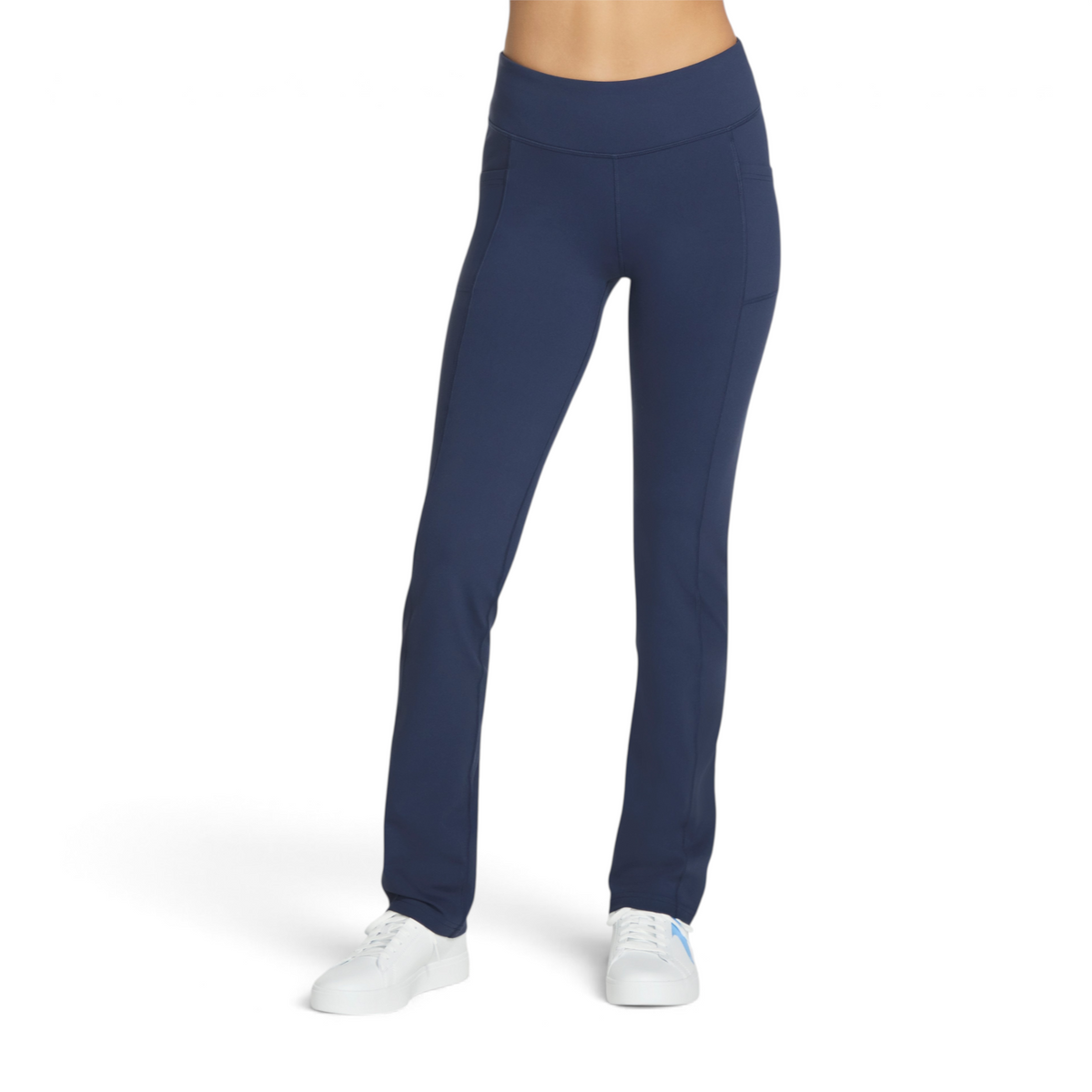 FRG THE GOWALK PANT OG in navy blue, featuring a high-waisted fit and side pockets on a model wearing white sneakers.