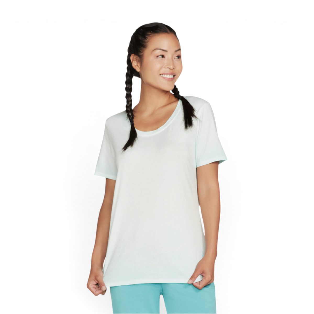 FRG women's light blue knit tunic tee with a scoop neckline worn by a smiling model with braided hair