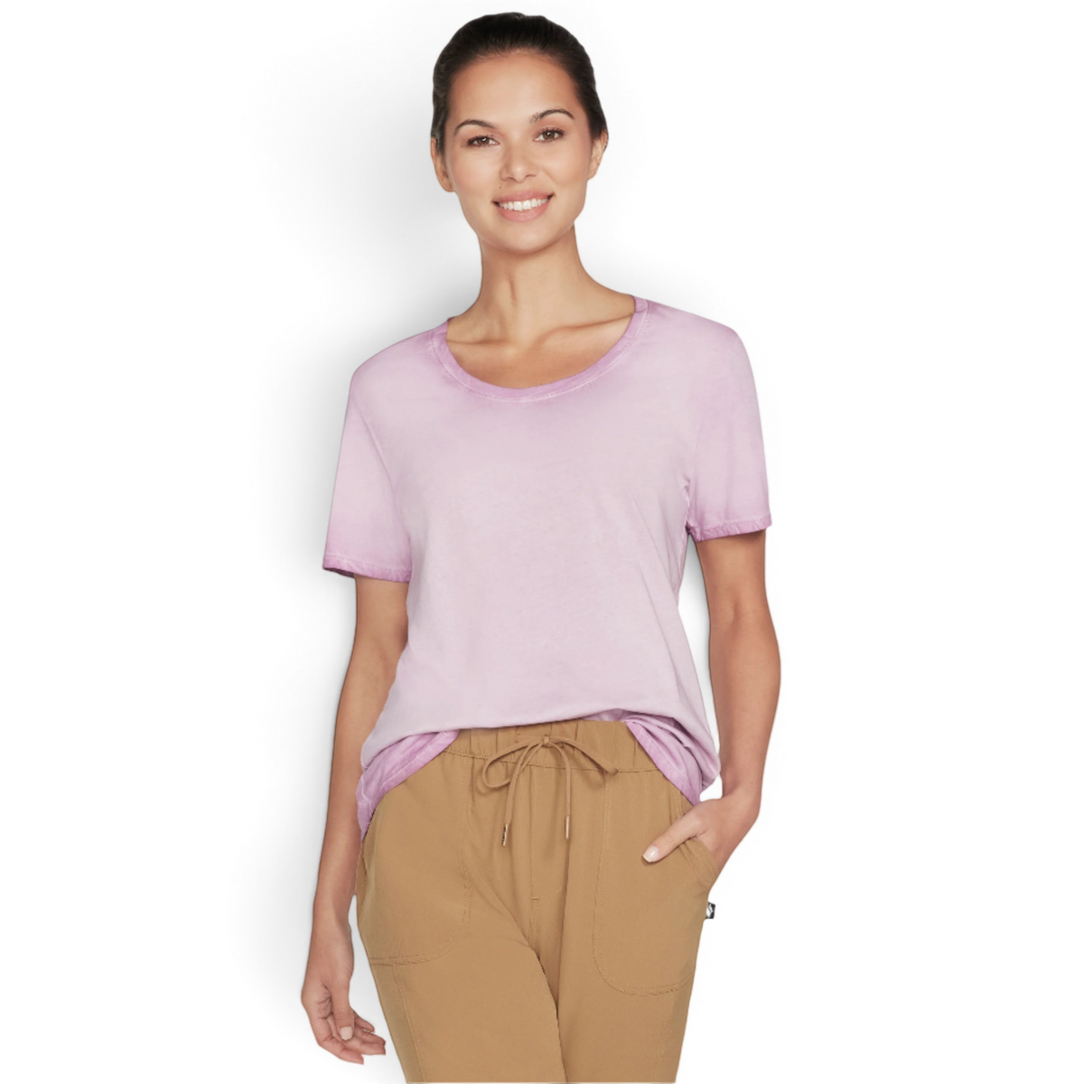 FRG women's light purple knit tunic tee with a crew neck, worn by a smiling model with tan drawstring pants.
