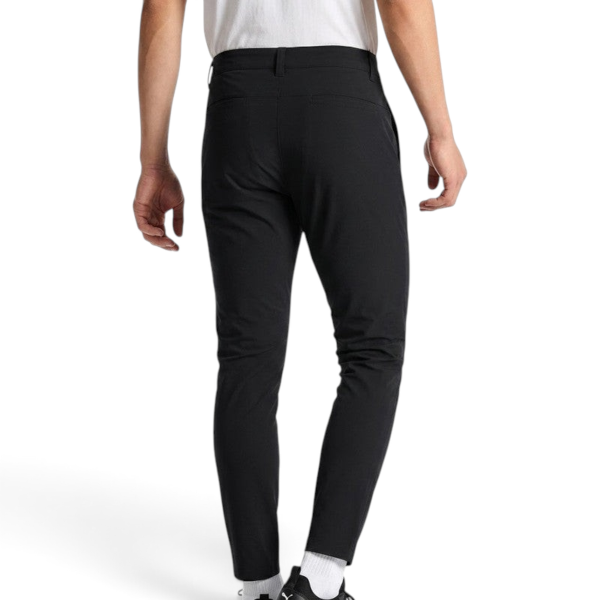 FRG ANTA men's black woven track pants with a tapered fit, shown from the back for training and casual wear.