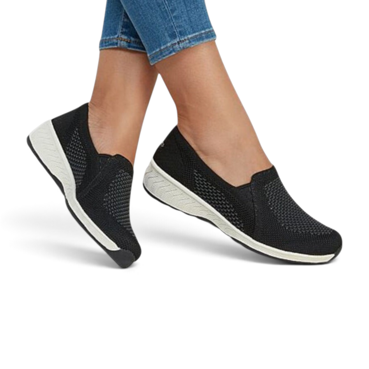 FRG Skechers Up-Lifted black knit slip-on shoes with white wedge heel and memory foam comfort worn on feet