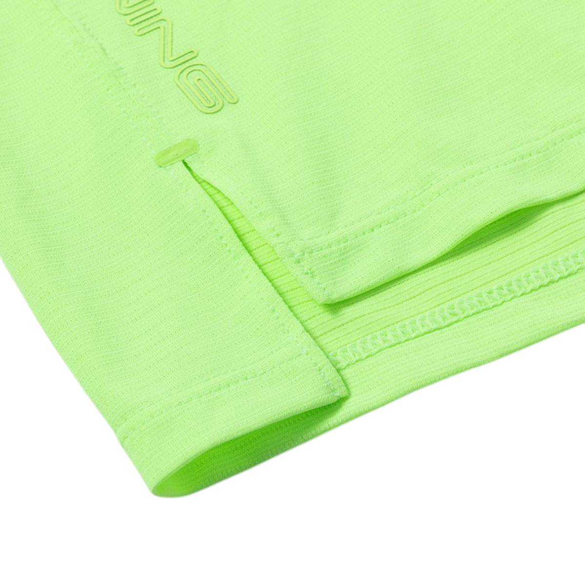 FRG ANTA fluorescent green running t-shirt hem detail with moisture-wicking fabric and side slit