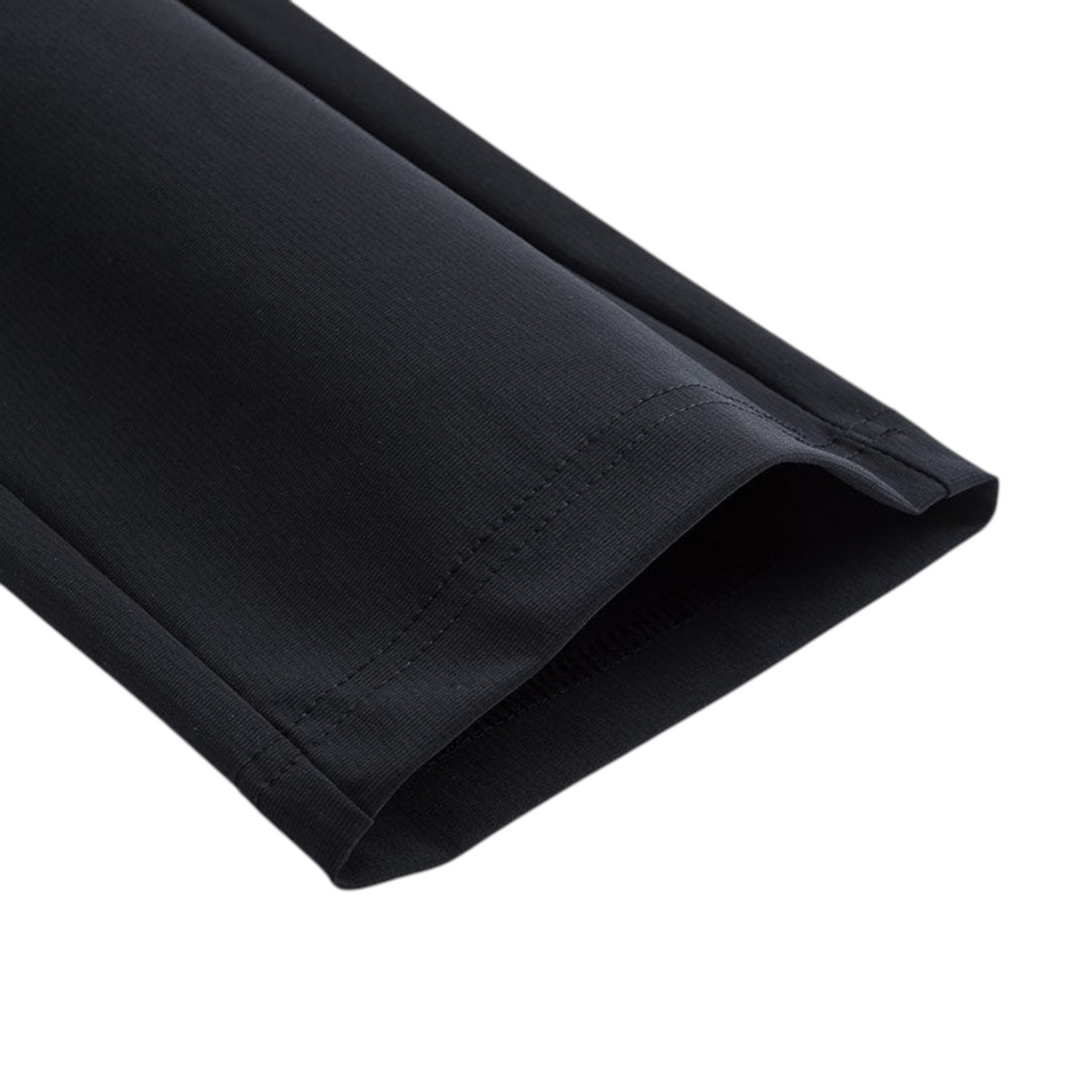 FRG ANTA Splash Express black knit track pants featuring a close-up of the hem with durable stretch fabric