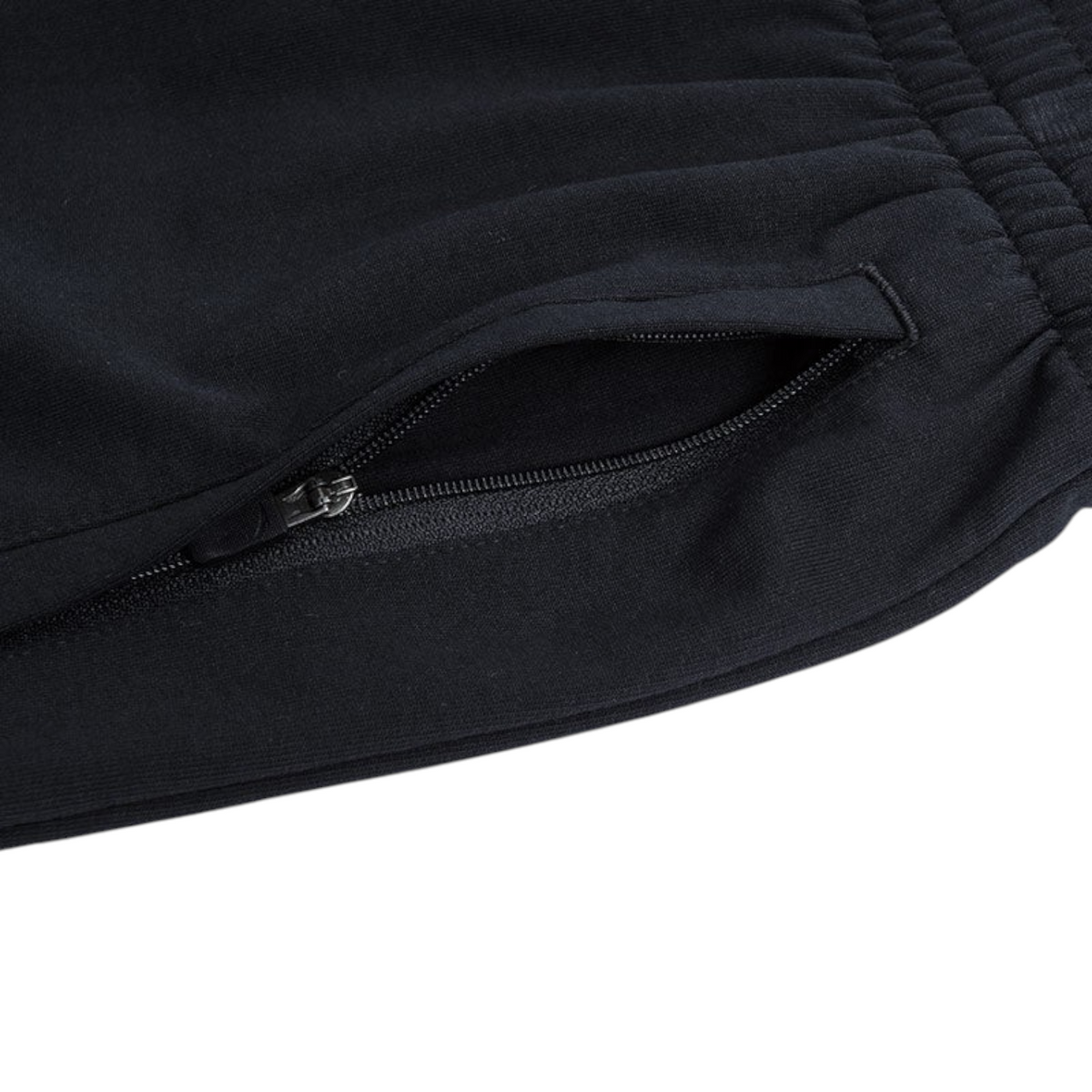 FRG black knit half pants featuring a secure zippered side pocket and comfortable elastic waistband