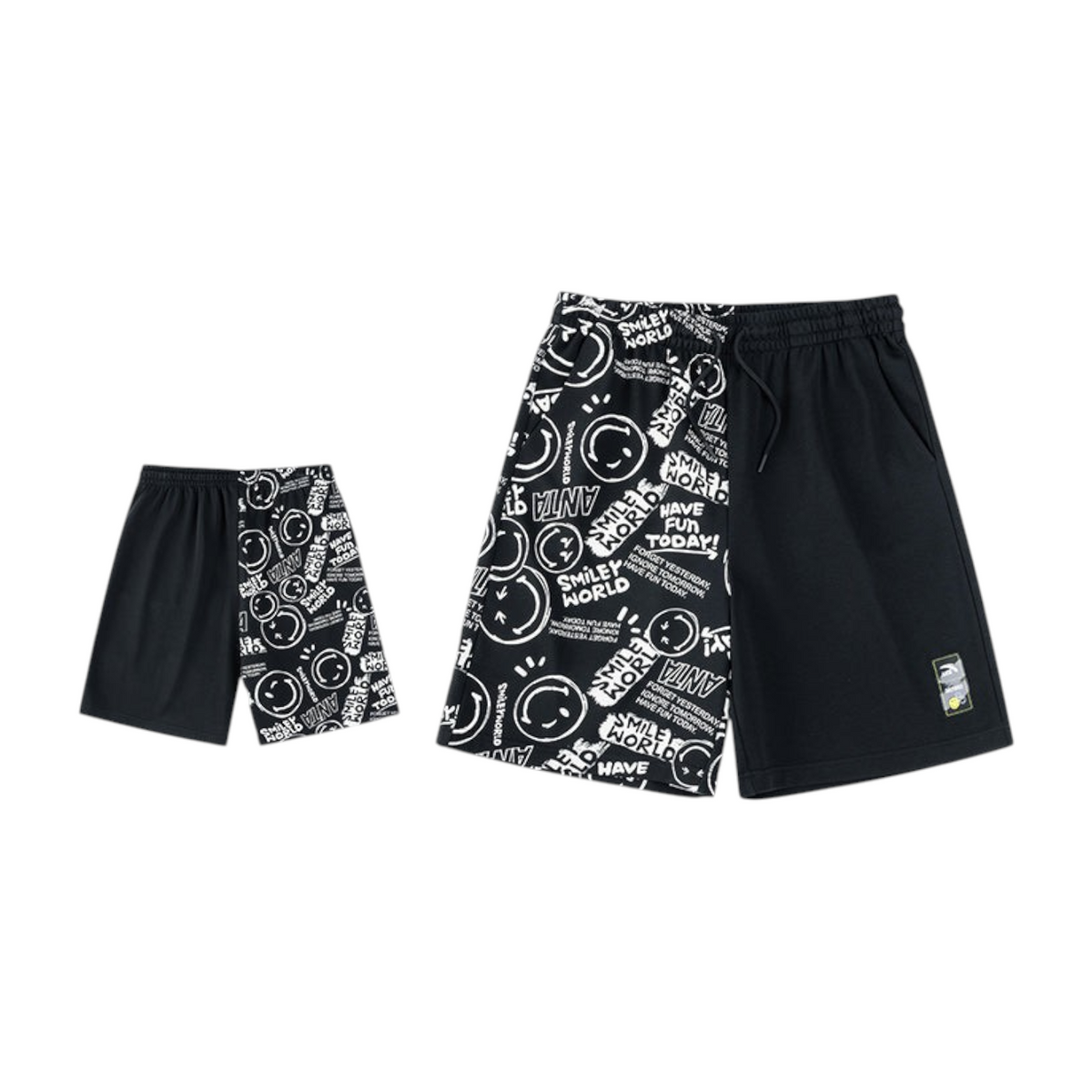 FRG ANTA black knit shorts featuring a split design with Smiley World graphic print and solid black panel