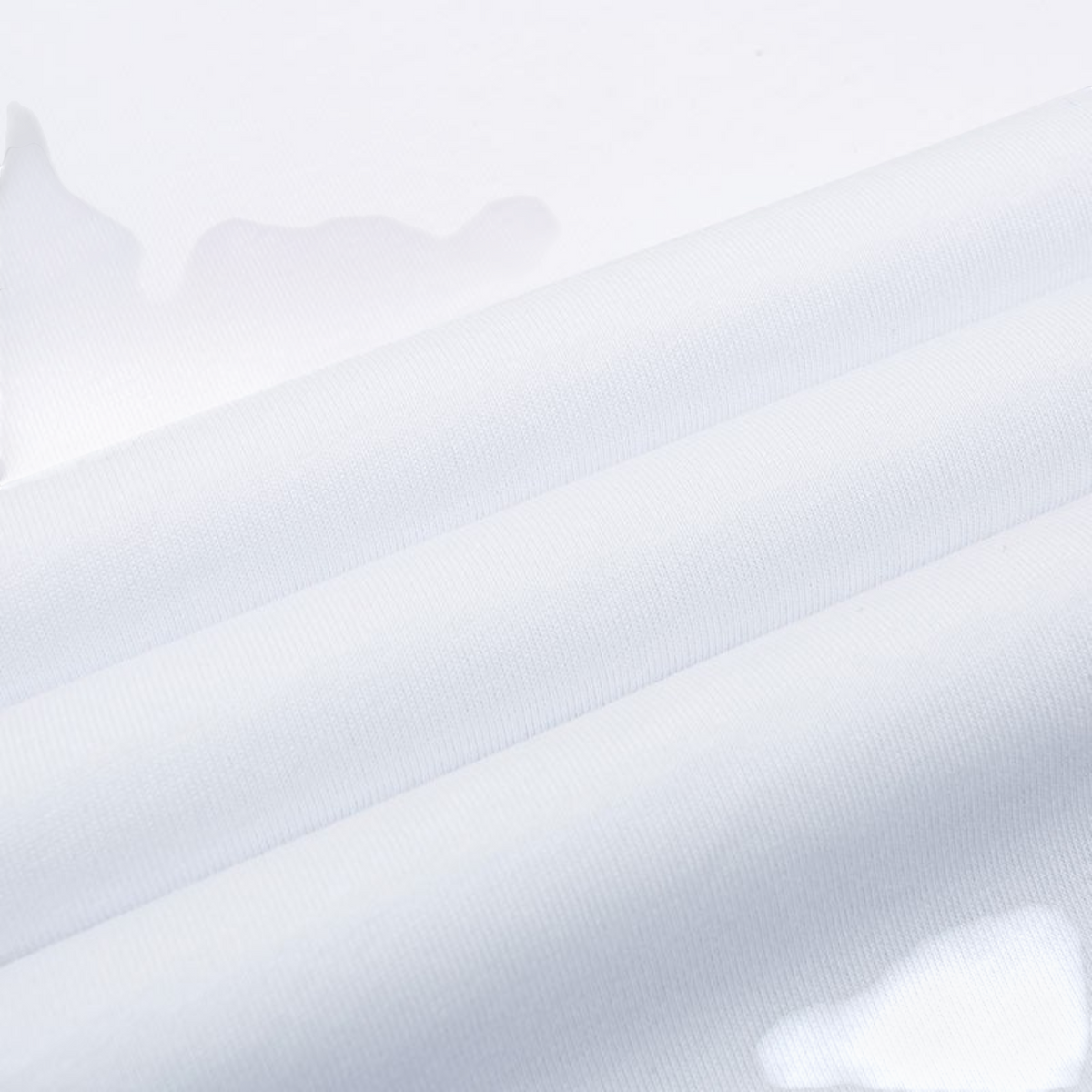FRG ANTA white cross training t-shirt fabric detail showing soft cotton-polyester blend texture