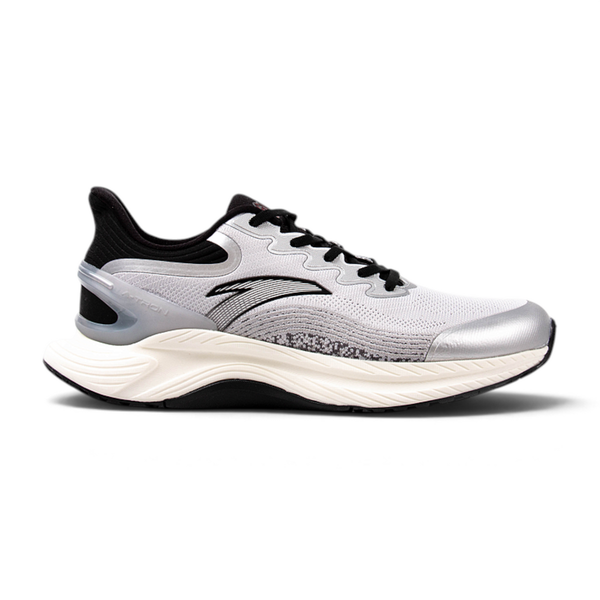 FRG running shoes in silver and white with a thick cushioned sole and black accents, side view