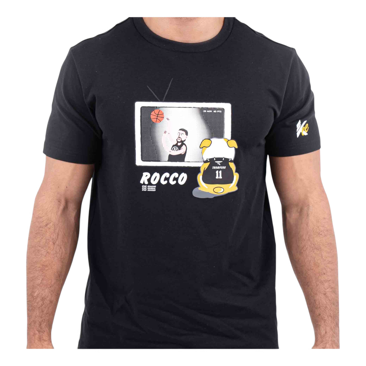 FRG black cotton t-shirt featuring a graphic print of a basketball player on TV and a cartoon dog mascot