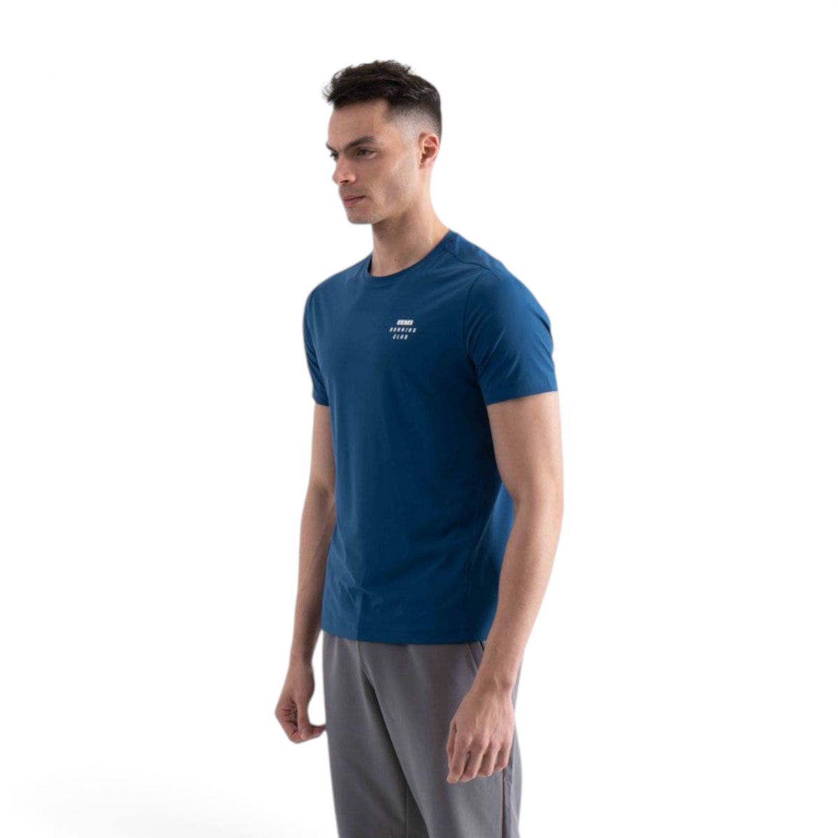 FRG blue short sleeve crew neck t-shirt with small white chest logo worn by a man against a white background